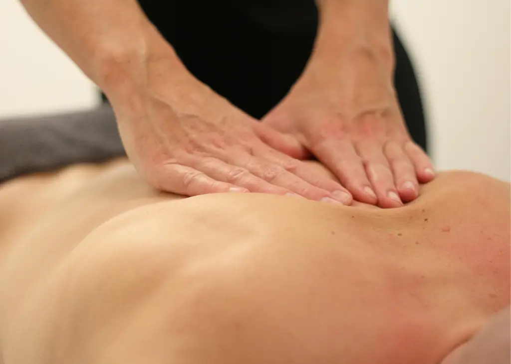 Picture of a back being massaged