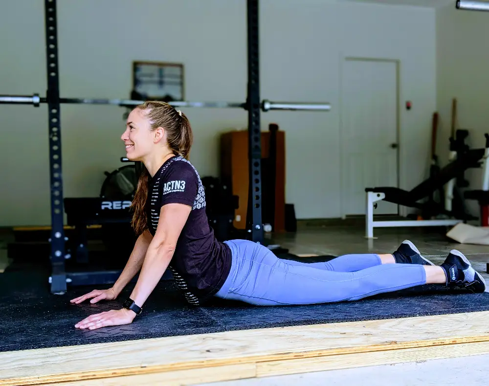 Prone press up or repeated extension in lying